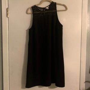 Black dress with beautiful shoulder details.